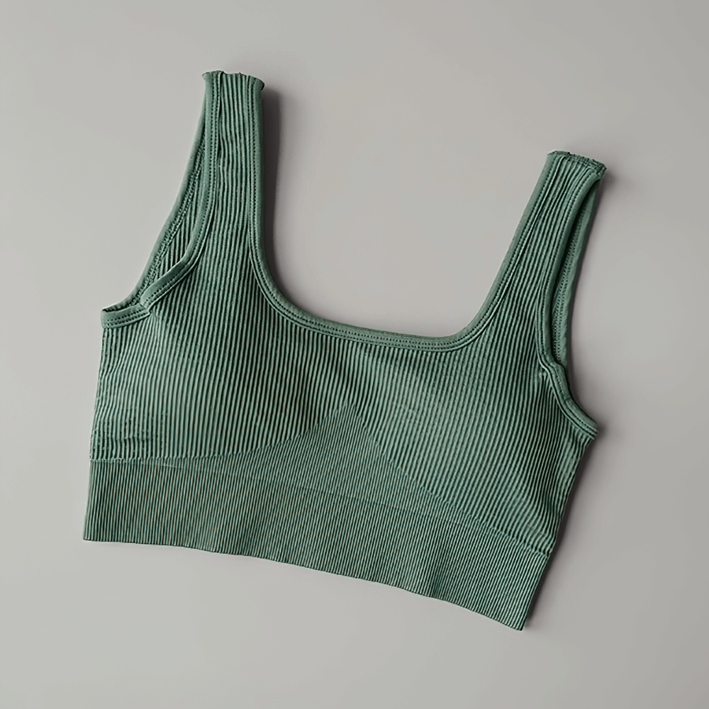 Seamless ribbed sports bra for women, SF2186, in green. Made of breathable nylon and spandex with removable cups for yoga and running.